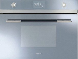 Компактный духовой шкаф с пароваркой Смег SF4120VCS фото в Санкт-Петербурге Компактный духовой шкаф с пароваркой Smeg SF4120VCS фото в Санкт-Петербурге