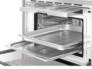 Компактный духовой шкаф с пароваркой Smeg SF4750VCBS фото 4 в Санкт-Петербурге