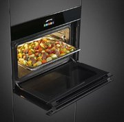 Духовой шкаф комбинированный с пароваркой Smeg SF4604PVCNX1 фото 4 в Санкт-Петербурге