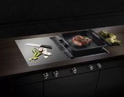 Индукционная варочная панель с вытяжкой Kuppersbusch KMI 9850.0 SR фото 2 в Санкт-Петербурге