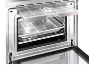 Компактный духовой шкаф с пароваркой Smeg SF4750VCBS фото 2 в Санкт-Петербурге