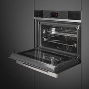Компактный духовой шкаф с пароваркой Smeg SF4104WVCPN фото 4 в Санкт-Петербурге